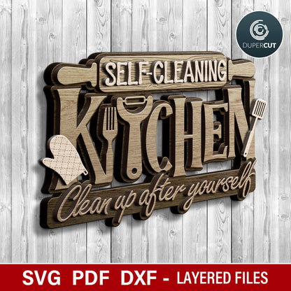 Wooden sign with 'Self-Cleaning Kitchen' text on a wooden background, featuring SVG, PDF, DXF vector files. Layered funny phrase for laser cutting machines Glowforge, Xtool, Cricut, CNC plasma, scroll saw pattern by www.DuperCut.com