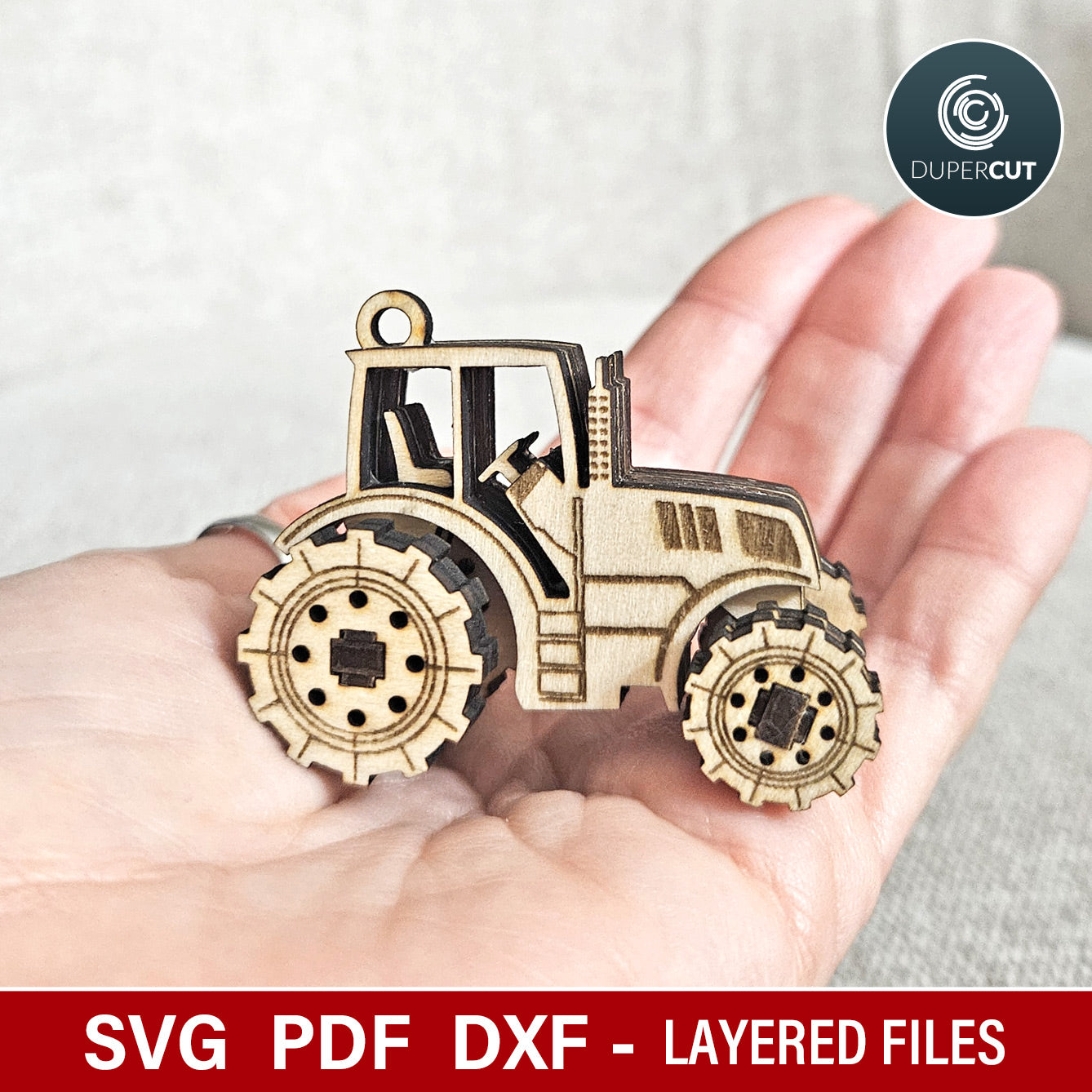 Mini Tractor fidget toy with moving wheels. Laser cut file for Glowforge, Xtool by www.dupercut.com