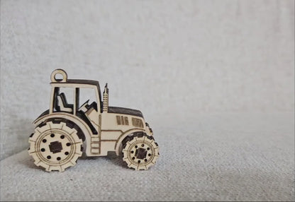 Mini Tractor fidget toy with moving wheels. Laser cut file for Glowforge, Xtool by www.dupercut.com